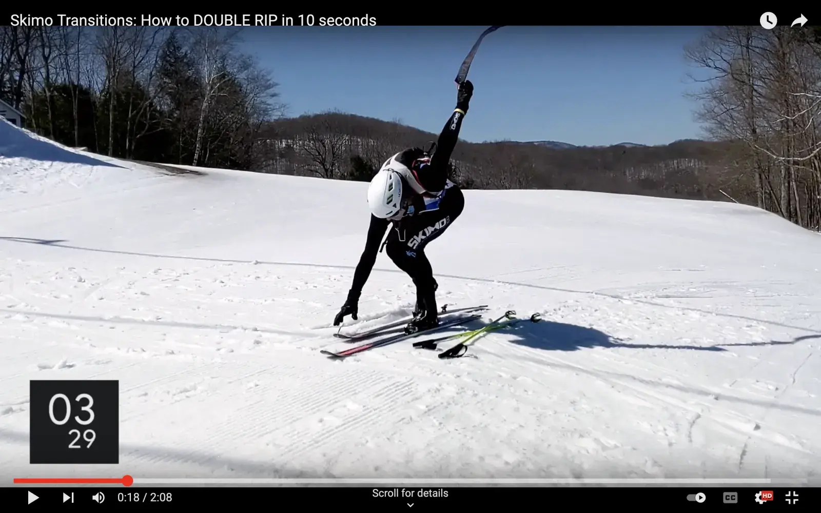 An image of a skimo racer ripping the second skin during the double-rip skin-to-ski transition